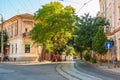 Revolution street in the old district of the city of Yevpatoria, with old buildings and single-track tram tracks Royalty Free Stock Photo