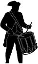 revolutionary war soldier drumming and marching in silhouette Royalty Free Stock Photo