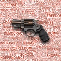 Revolver Gun with background concept of human rights