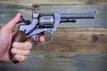 Revolver gun in a human hand Royalty Free Stock Photo