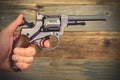 Revolver gun in a human hand Royalty Free Stock Photo