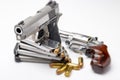 Revolver handgun and Automatic pistol with .45 bullets on white background Royalty Free Stock Photo