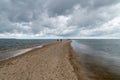 View on sandy Rewa peninsula with people in the end at cloudy day Royalty Free Stock Photo