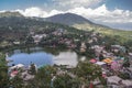 Rewalsar town encircles Rewalsar Lake, near Mandi, Northern India Royalty Free Stock Photo