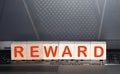 reward word background on wood blocks Royalty Free Stock Photo