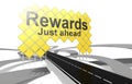 Rewards just ahead word on giant yellow road signs Royalty Free Stock Photo