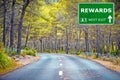 REWARDS road sign against clear blue sky Royalty Free Stock Photo