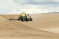 Farm implements planting wheat in the farm fields of Idaho. Royalty Free Stock Photo