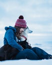 Reykholt, Iceland, Iceland 21. December 2019. Young dog lover girl enjoying her time outside with her best friend and lovely dog