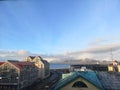 Reykjavik buildings, road, ocean and mountains view