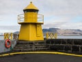 Reykjavik harbor yellow lighthouse