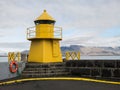 Reykjavik harbor yellow lighthouse