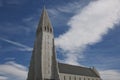 Hallgrimskirkja Cathedral in Reykjavik, Iceland, lutheran parish church, exterior in a sunny summer day with a blue cloudy sky Royalty Free Stock Photo