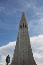 Hallgrimskirkja Cathedral in Reykjavik, Iceland, lutheran parish church, exterior in a sunny summer day with a blue cloudy sky Royalty Free Stock Photo