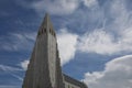 Hallgrimskirkja Cathedral in Reykjavik, Iceland, lutheran parish church, exterior in a sunny summer day with a blue cloudy sky Royalty Free Stock Photo