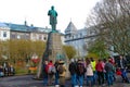 Reykjavik Iceland, May12 2018: Tourists gather around a statue i