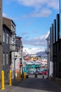 Narrow street in downtown Reykjavik with Old harbor view, Iceland Royalty Free Stock Photo