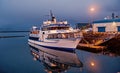 Reykjavik, Iceland - October 14, 2017: cruise ship at sea pier at dusk. Ship at sea shore on evening sky. Water Royalty Free Stock Photo