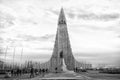 Reykjavik, Iceland - October 12, 2017: hallgrimskirkja church and people on cloudy sky. Cathedral building with concrete