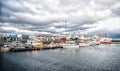Reykjavik, Iceland - October 13, 2017: yachts at sea pier at small village. Sailing boats at coast on cloudy sky. Water