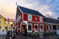 Reykjavik, Iceland - 01.19.2020 : suta svinid gastro pub Reykjavik street view with typical nordic red house Royalty Free Stock Photo