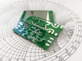 RF PCB in front of Smith chart Royalty Free Stock Photo