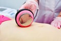 Rf skin tightening, belly. Hardware cosmetology. Body care. Non surgical body sculpting. Ultrasound cavitation body contouring tre Royalty Free Stock Photo