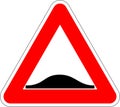 Vector image of a warning sign for drivers - bump on the road. Royalty Free Stock Photo
