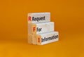 RFI request for information symbol. Concept words RFI request for information on blocks on a beautiful orange table, orange