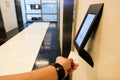 RFID reader in front of the elevator which only allow authorized person in the building to use. One of security feature in modern