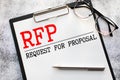 RFP- Request For Proposal written in notebook