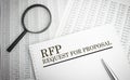RFP - Request for Proposals. text on white paper on yellow background