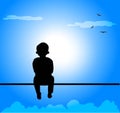Silhouette of child against blue skies
