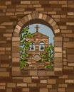 View from the arched window of the ancient medieval church in romanesque style and olive tree