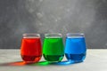 Rgb color water in glass on table Royalty Free Stock Photo