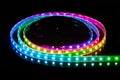 RGB LED strip on reel with black background Royalty Free Stock Photo