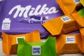 RHEINBACH, GERMANY 25 July , 2020 A bar of Milka chocolate with lots of colorful, square-packed Rittersport sweets