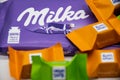 RHEINBACH, GERMANY 25 July , 2020 A bar of Milka chocolate with lots of colorful, square-packed Rittersport sweets