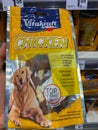 Rheinbach, Germany 15 March 2021, A pack of `Vitakraft` dog treats in the hand of a customer