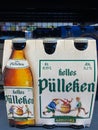 Rheinbach, Germany 1 March 2021, A six-pack of `Veltins Helles PÃÂ¼lleken` beer on the shelf of a German supermarket