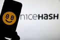 Rheinbach, Germany 11 November 2021, The brand logo of `NiceHash` on the display of a smartphone focus on the brand logo