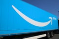 View on isolated blue truck trailer with Amazon prime logo and lettering