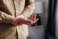 Rheumatoid arthritis concept. Close up of male suffer from numbing pain in hand, numbness fingertip, arthritis inflammation, Royalty Free Stock Photo