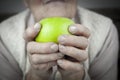 Rheumatoid arthritis hands and fruits Royalty Free Stock Photo