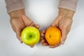 Rheumatoid arthritis hands and fruits Royalty Free Stock Photo