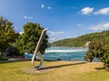 Rhine Fall river side with the `Dreiklang bei Nacht` Triad by night sculpture Royalty Free Stock Photo