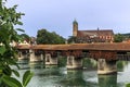 The Rhine with the historic wood bridge and Fridolins minster in Bad Saeckingen