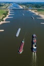 aerial view commercial ships crossing the River Rhine