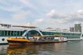 Rhine river cruise ship being refueled by a fuel boat in the Dutch harbour of amsterdam Royalty Free Stock Photo