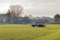 Rhine valley farmer fertilizing field before winter